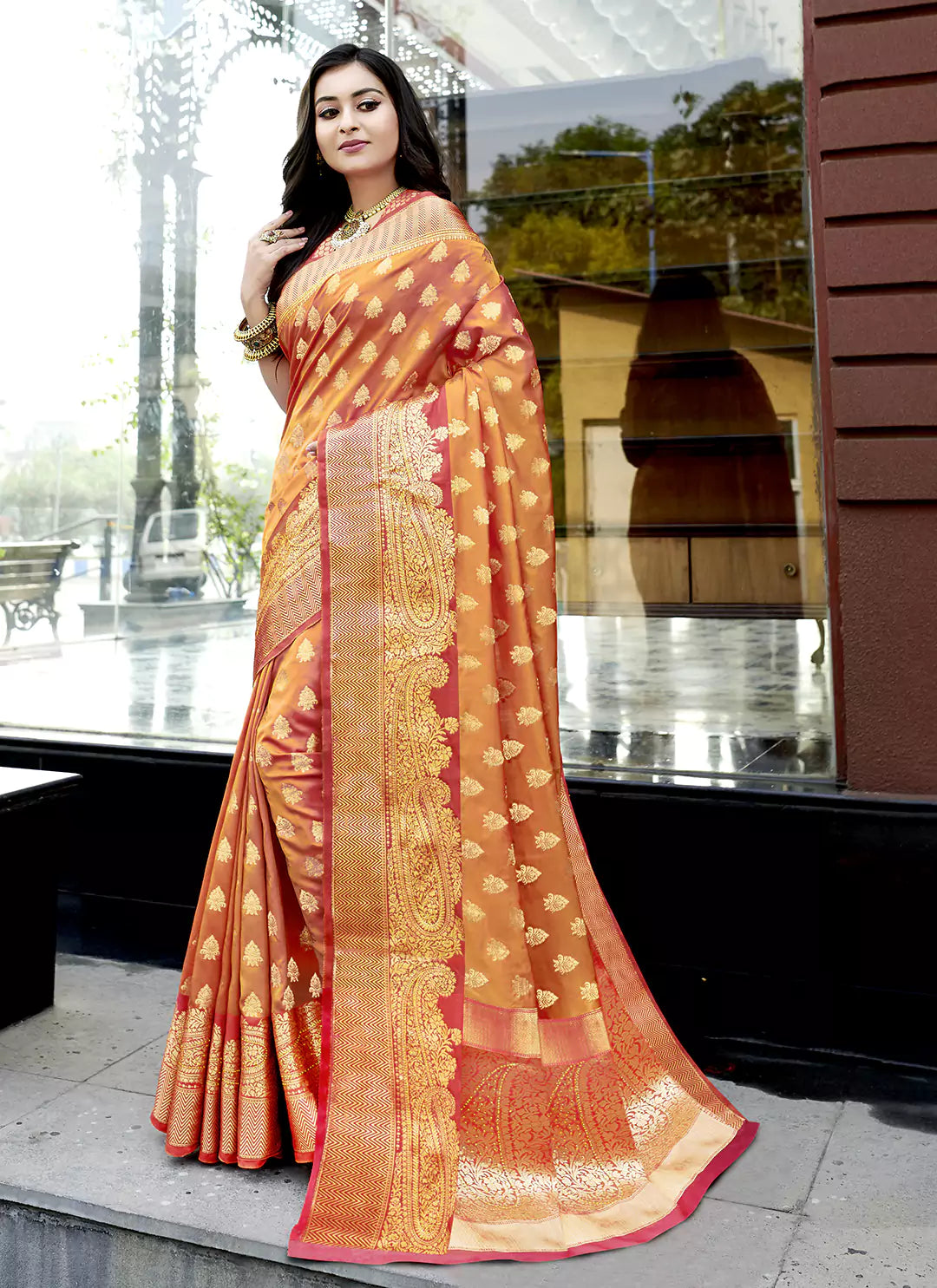 Swarovski Stone Worked Orange Banarasi Silk Saree - TREEVESTO