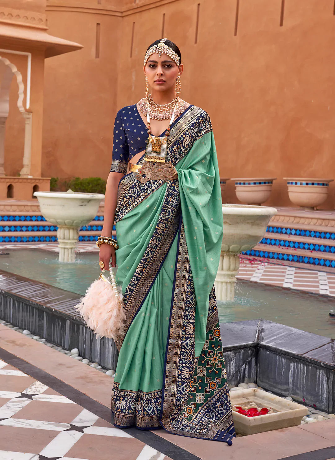 Pista Green Patola Silk Saree treevesto