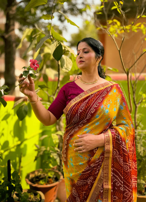 Bandhej With Floral Print Maroon & Yellow Pure Georgette Saree - TREEVESTO