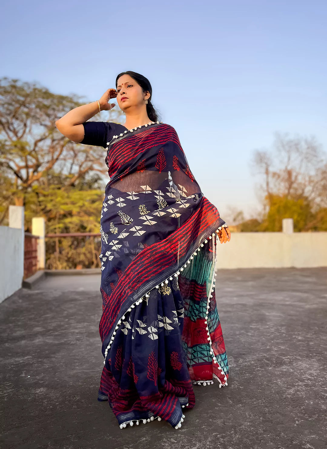 Batik Print Navy Blue Cotton Blend Saree With Pompoms treevesto