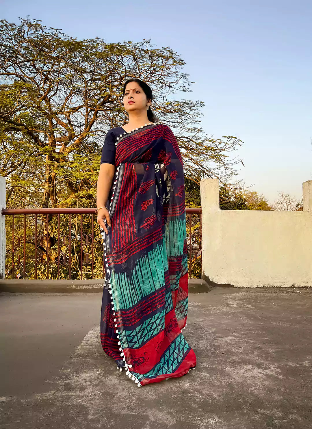 Batik Print Navy Blue Cotton Blend Saree With Pompoms treevesto