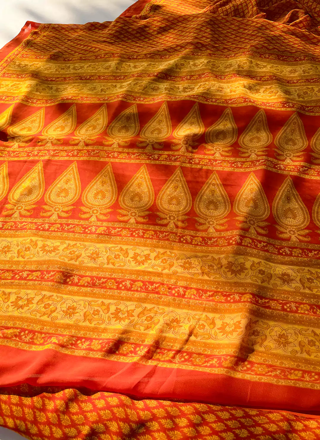 Buti Print Orange Soft Georgette Saree - TREEVESTO