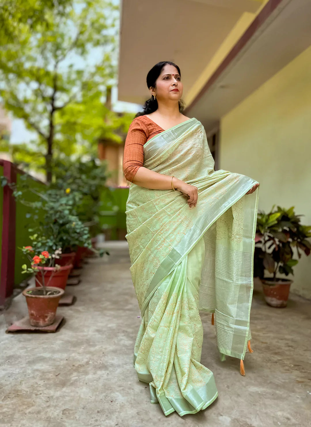 Fine Resham Embroidered Tea Green Soft Linen Saree - TREEVESTO