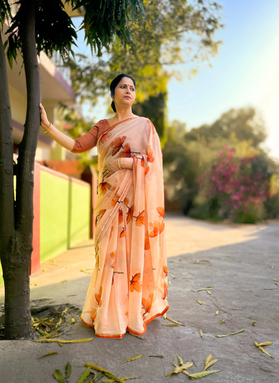 Floral Print Coral Colored Ultra Soft Weightless Chiffon Saree  TREEVESTO