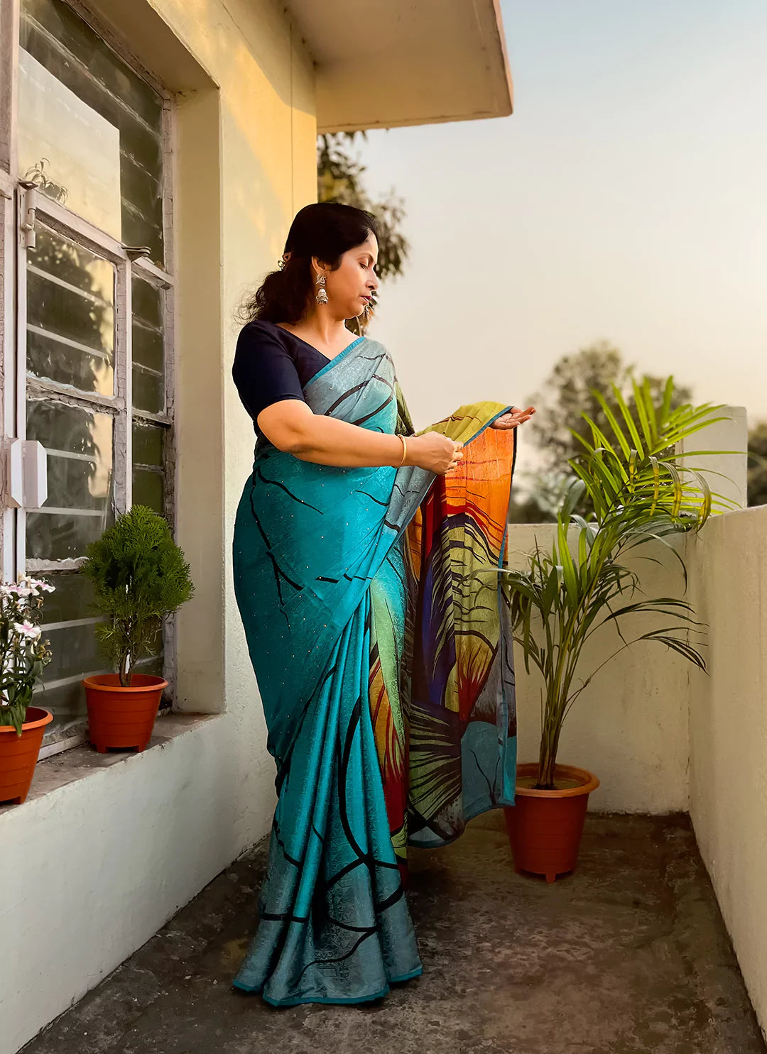 Mesmerizing Tanchoi Worked Blue Crepe Satin Silk Saree - TREEVESTO