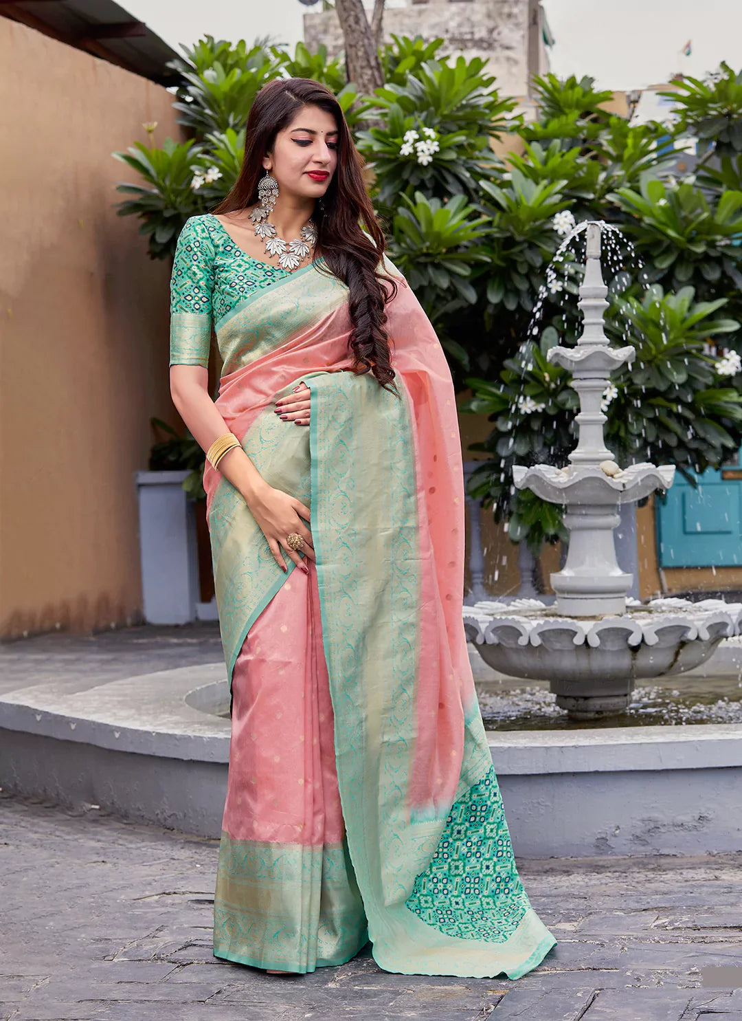 Pastel Pink Banarasi Silk Saree With Sea Green Contrast Border - TREEVESTO