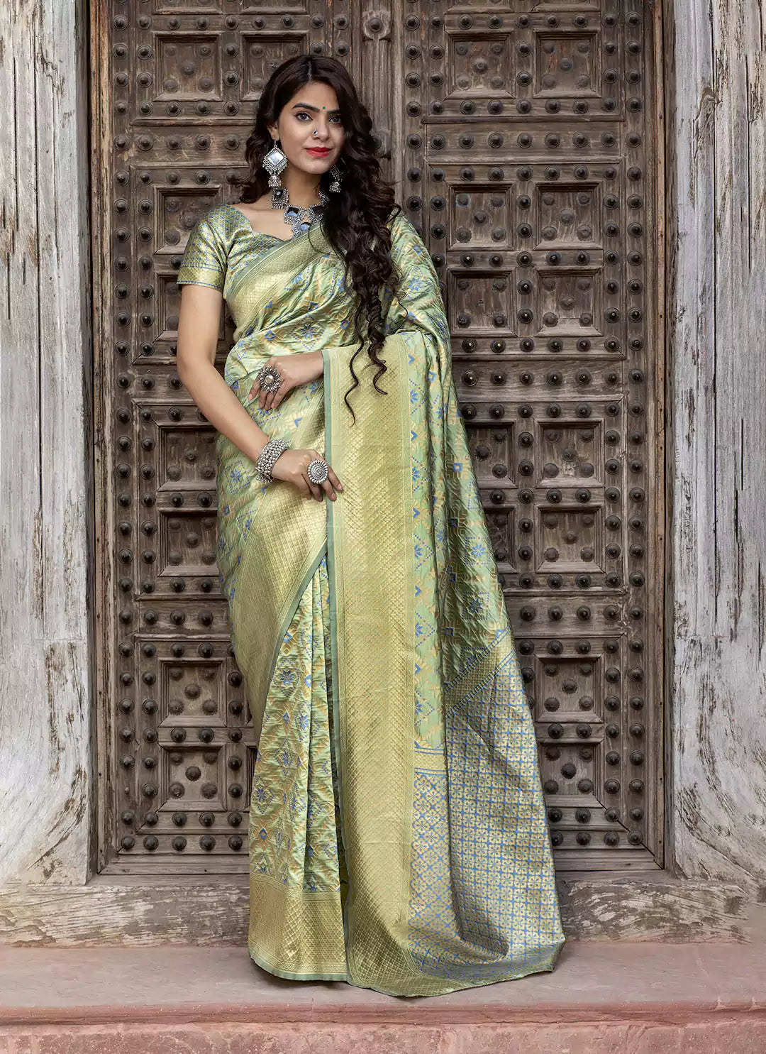 Patola Woven Pista Green Silk Saree - TREEVESTO