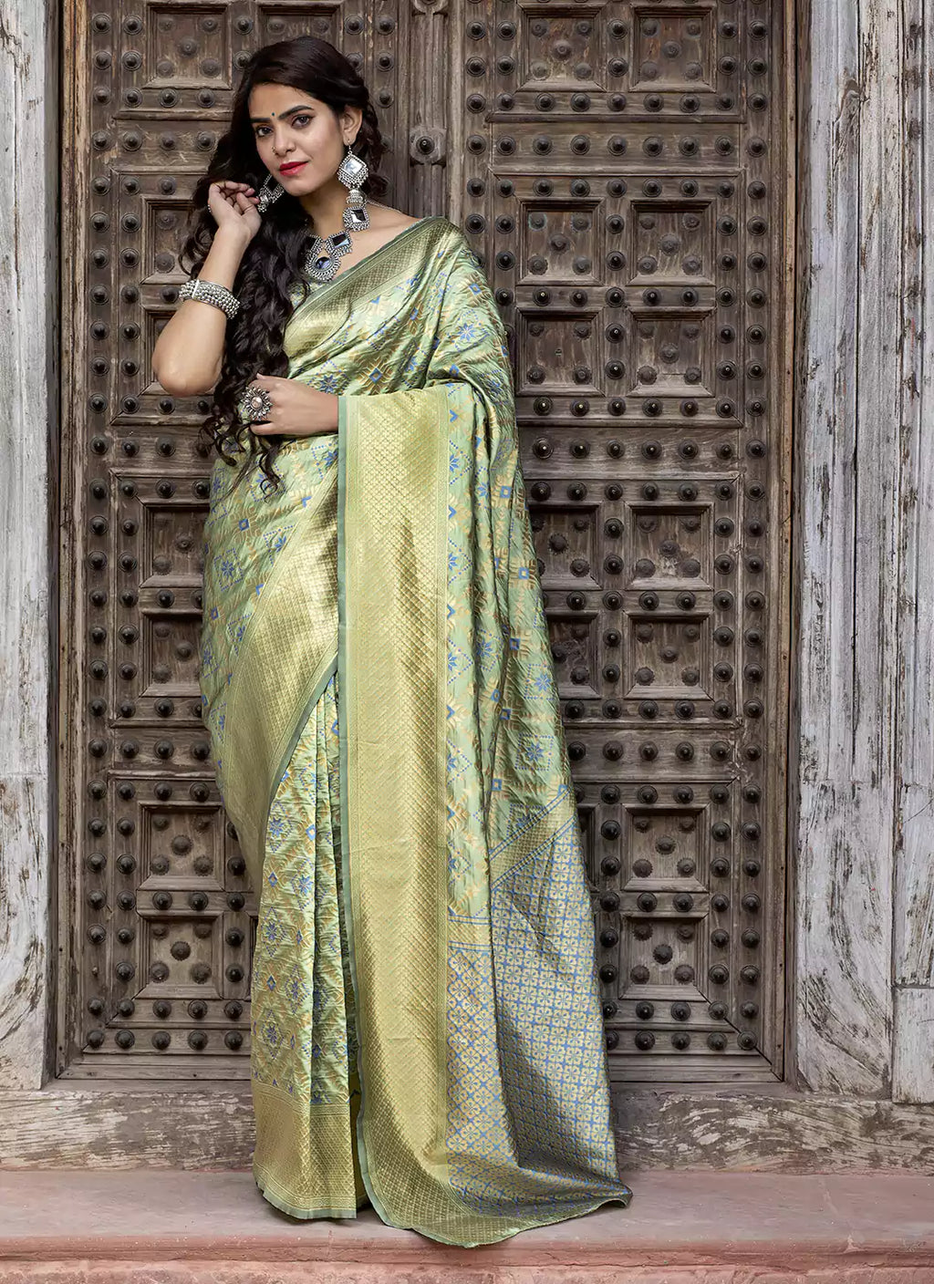 Patola Woven Pista Green Silk Saree - TREEVESTO