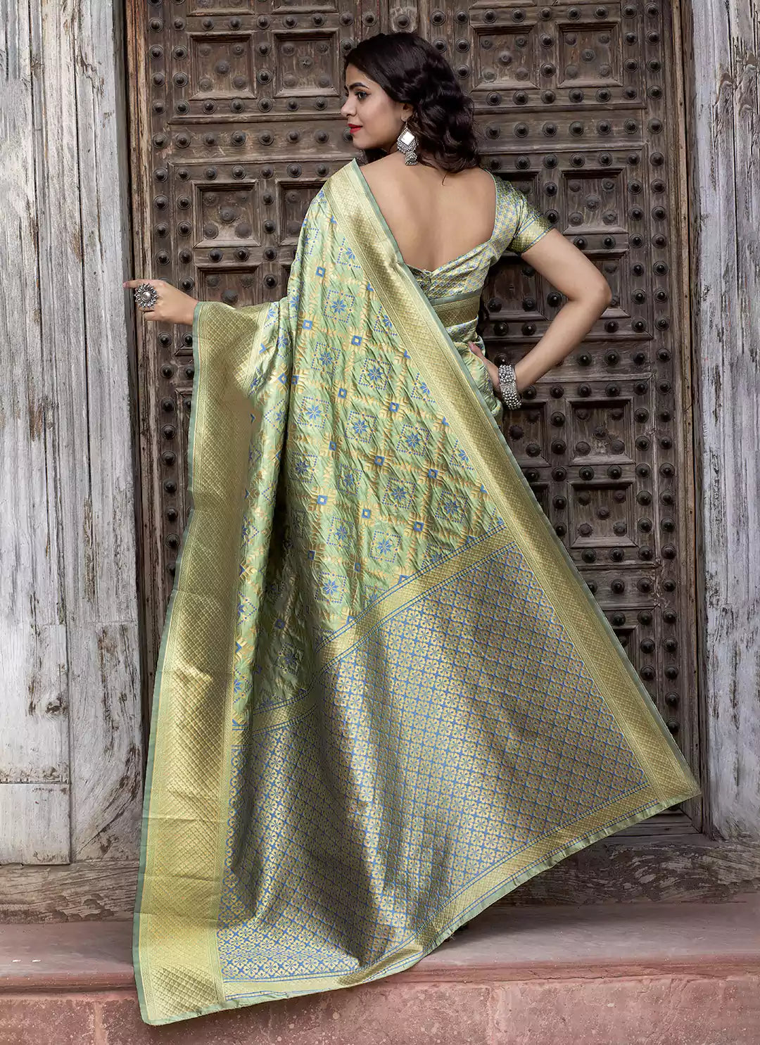Patola Woven Pista Green Silk Saree - TREEVESTO