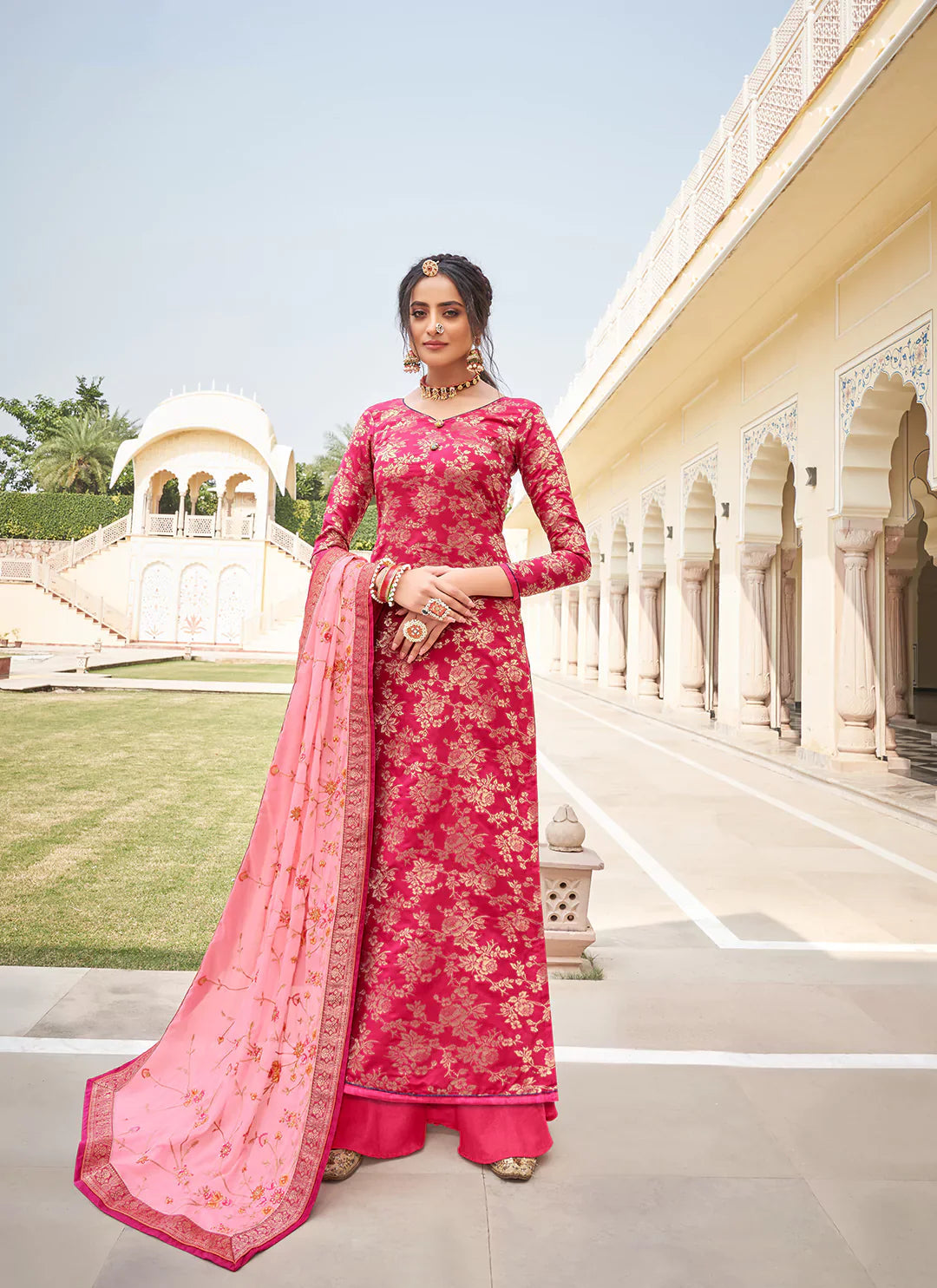 Rani Color Banarasi Silk Unstitched Suit With Heavy Work Dupatta treevesto