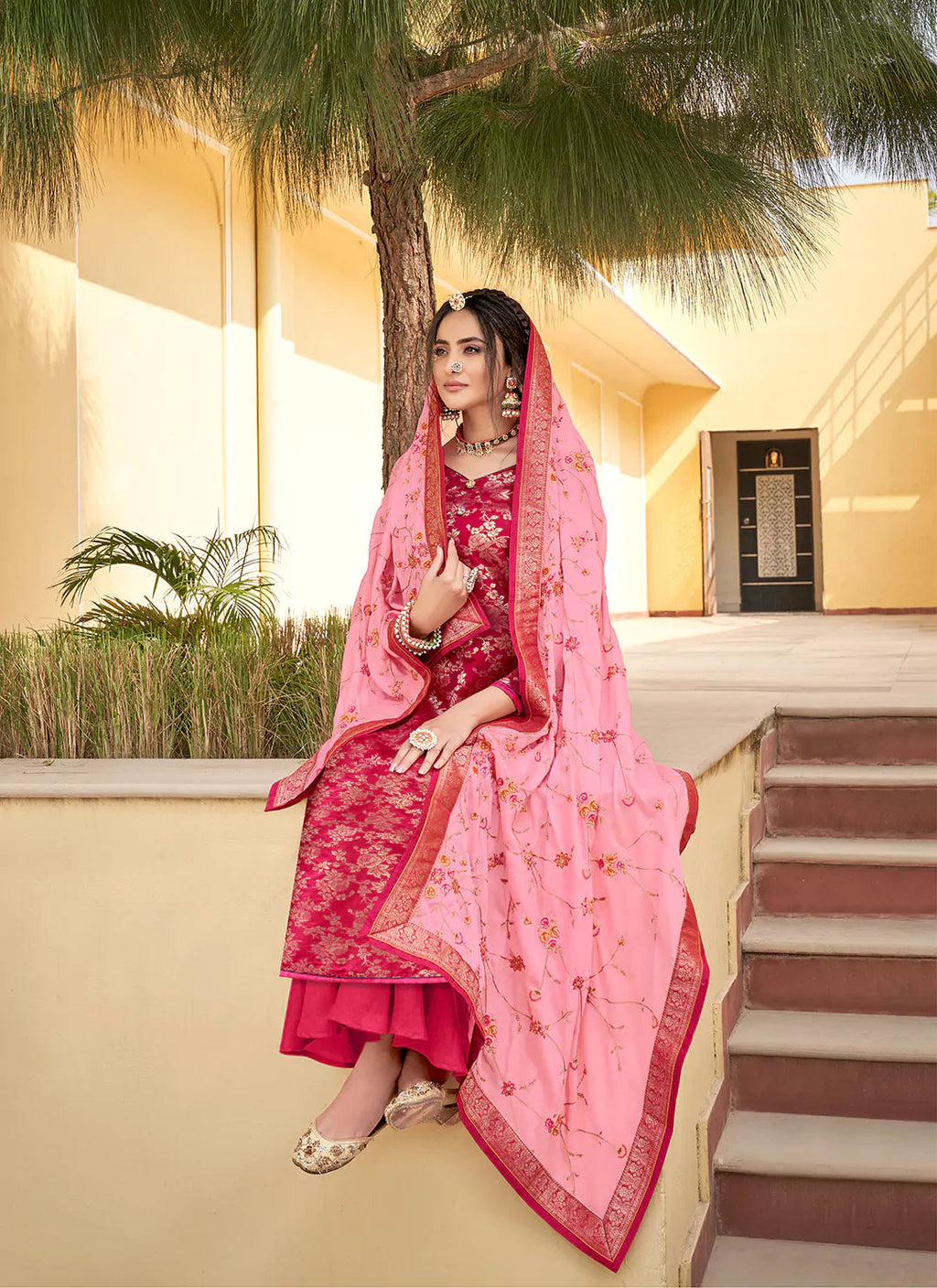 Rani Color Banarasi Silk Unstitched Suit With Heavy Work Dupatta treevesto