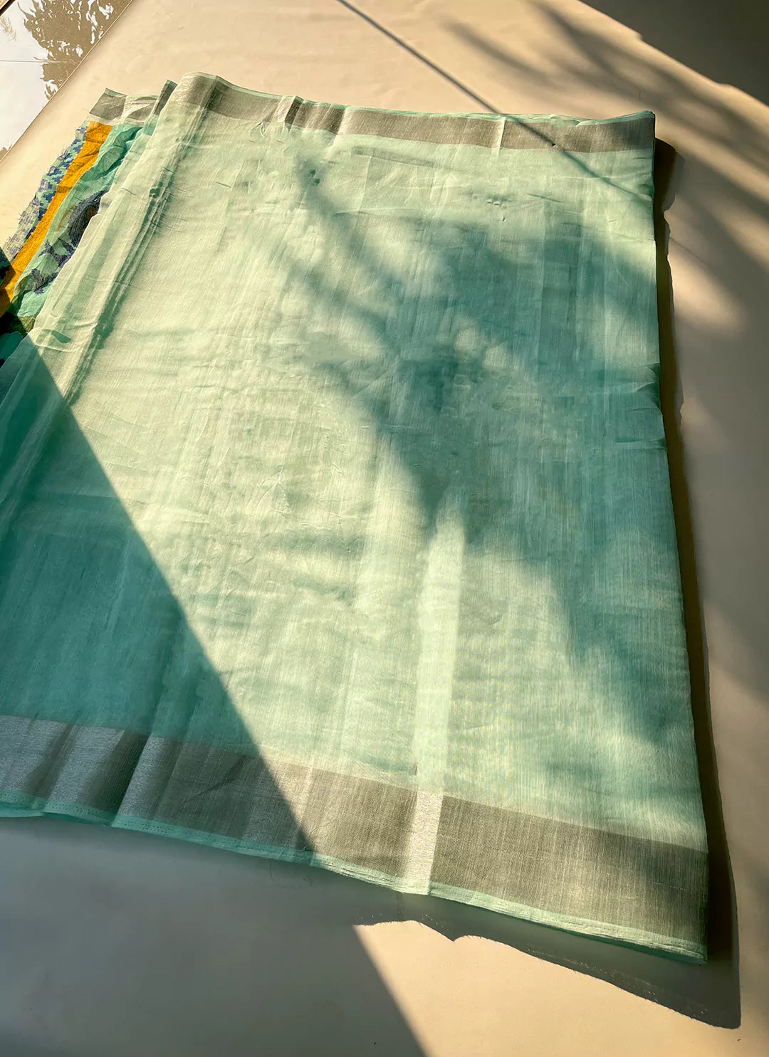 Sea Green Linen Cotton Printed Pallu Saree With Silver Border - TREEVESTO