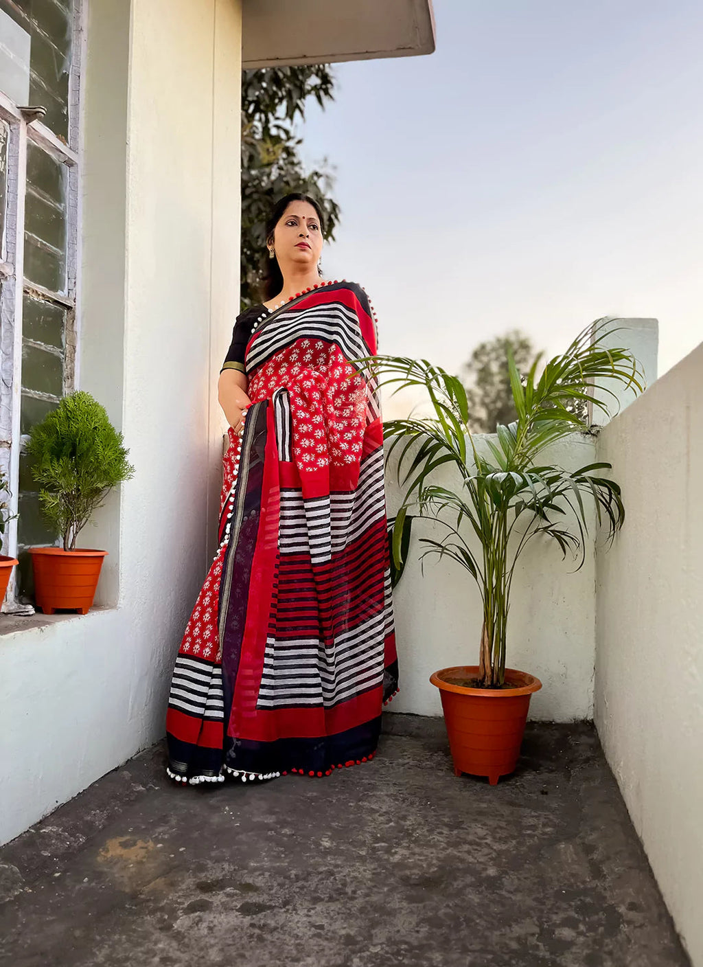 Red Black Cotton Blend Saree With Pompoms treevesto