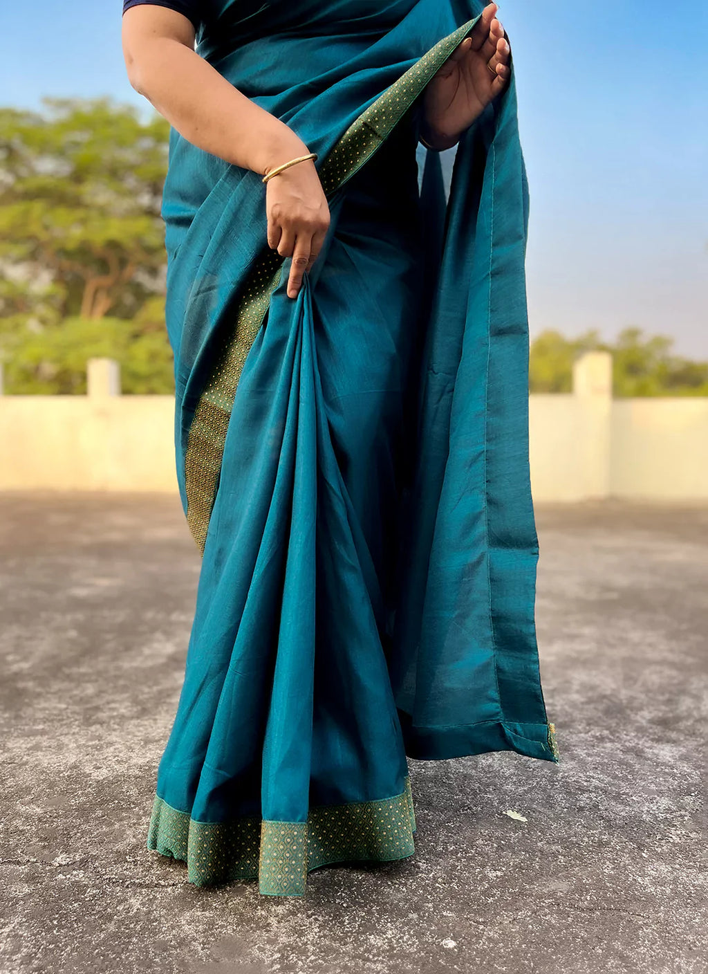 Teal Blue Dola Silk Plain Saree With Border - TREEVESTO
