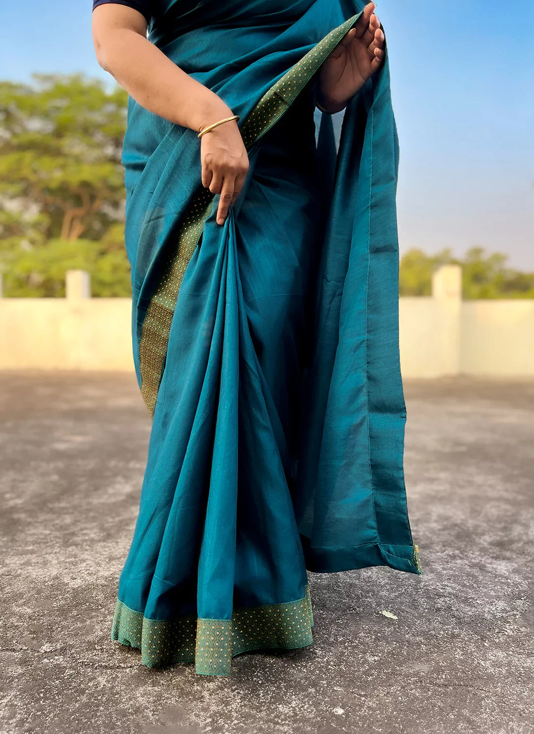 Teal Blue Dola Silk Plain Saree With Border - TREEVESTO